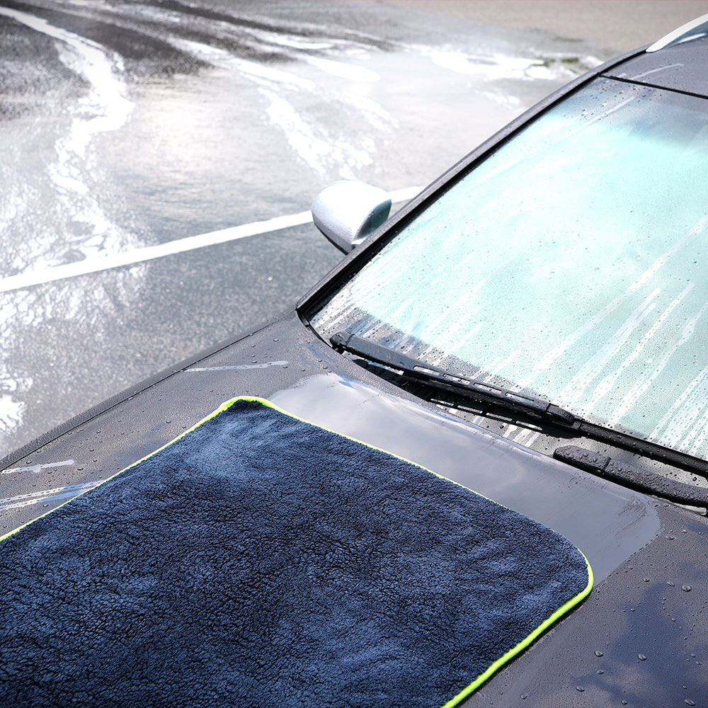absorb+ luxury drying towel on black car